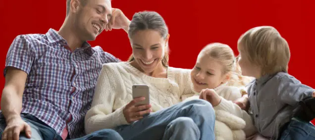 Family exploring HVAC financing options together